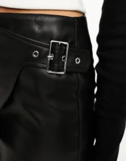 Design Faux Leather Wrap Skort With Buckle Details In