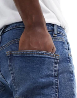 Design Skinny Jeans In Vintage Dark Blue