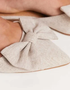 Design Wide Fit Lass Oversized Bow Pointed Flat Mules In