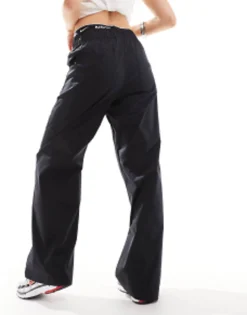 Nike Mini Swoosh High Rise Woven Trousers In