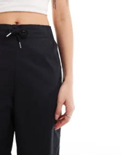 Nike Mini Swoosh High Rise Woven Trousers In