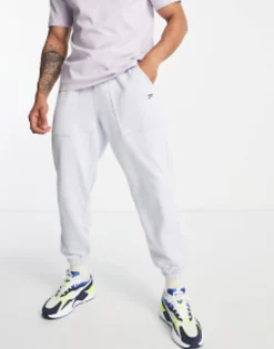 Puma Downtown Joggers With Checkerboard Pocket In Pale Blue