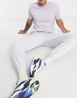 Puma Downtown Joggers With Checkerboard Pocket In Pale Blue
